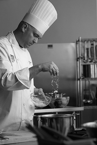 Chef Ike Frerichs prepares a ingredients for Hola, Pasta! Food Truck in his commissary kitchen in San Antonio, Texas.